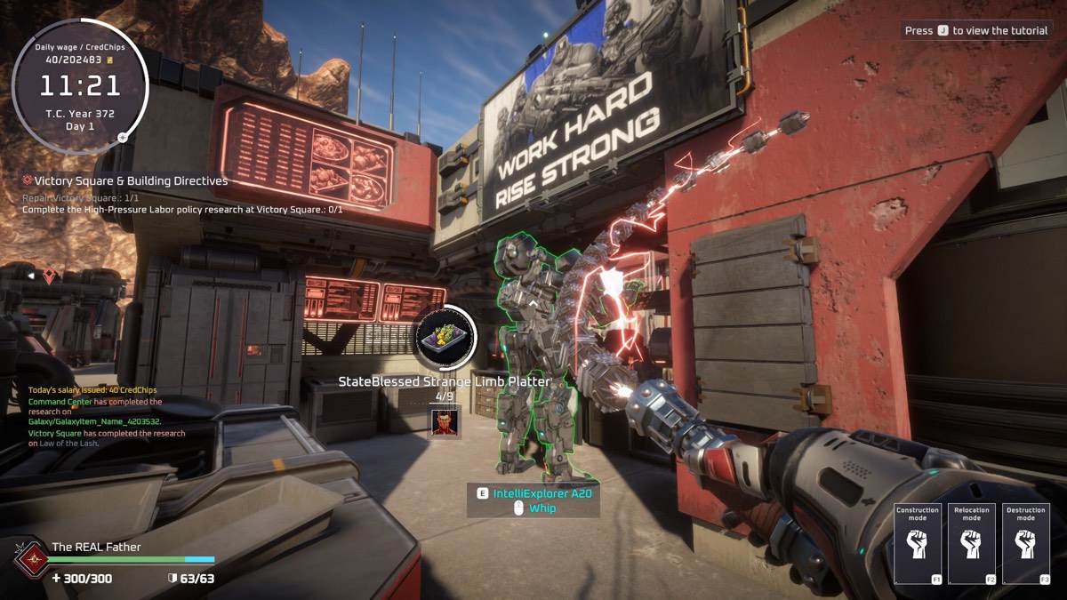 The colony HUD, showing a propaganda billboard reading WORK HARD RISE STRONG above a street of workers